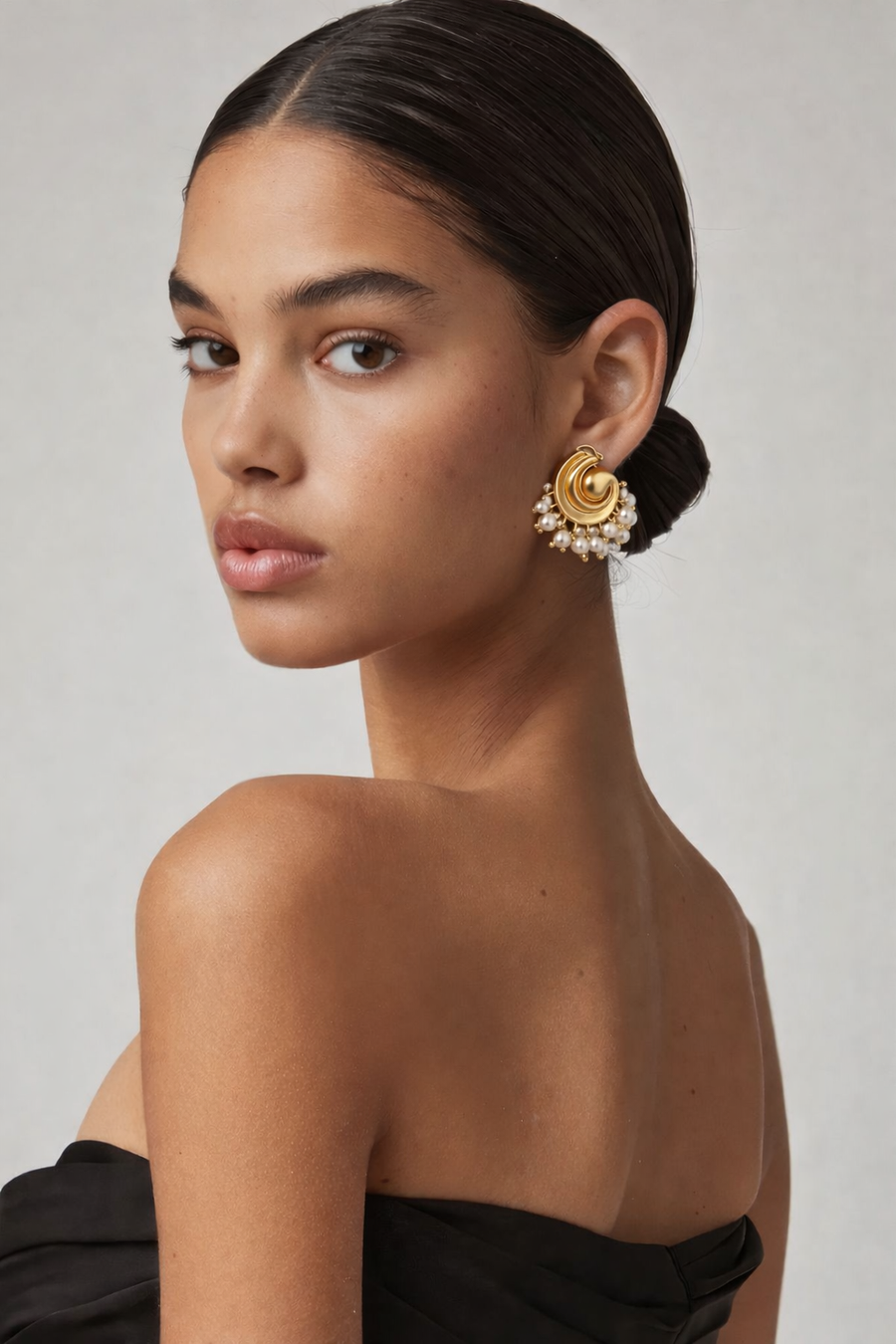 Close up of Spiral Pearls stud earrings
