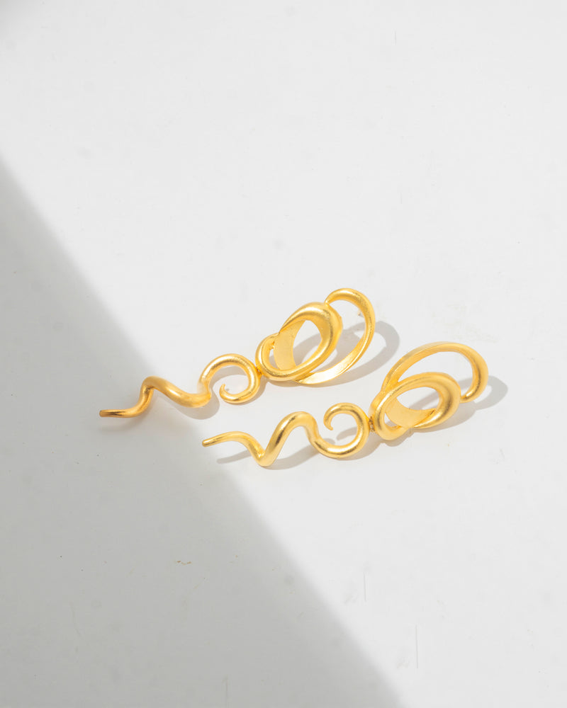 Snake charm earrings